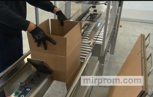 Процесс сборки гофрокороба на производственной линии