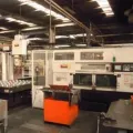 Токарный станок с ЧПУ и роботом -- Mazak, Multiplex 6300 + robot loader (вид сбоку)